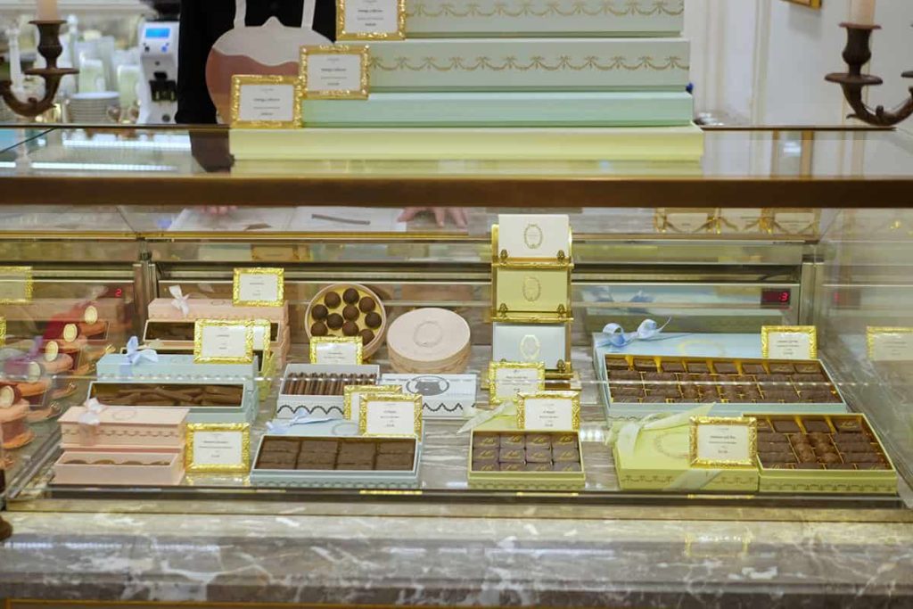Laduree chocolates displayed in gift boxes.